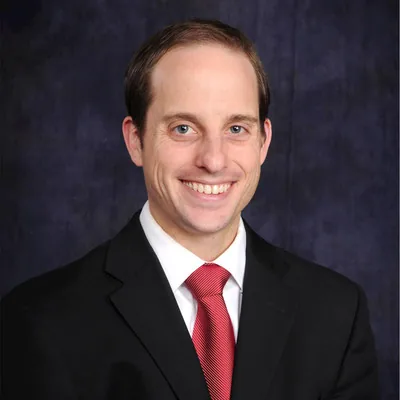 Portrait of A.J. Smith, Treasurer of the 2026 Ronald McDonald House Tulsa Board of Directors.