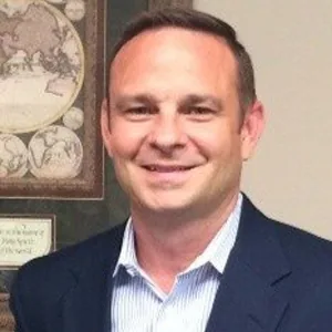 Portrait of Derrick Scott, Chair of the 2026 Ronald McDonald House Tulsa Board of Directors.